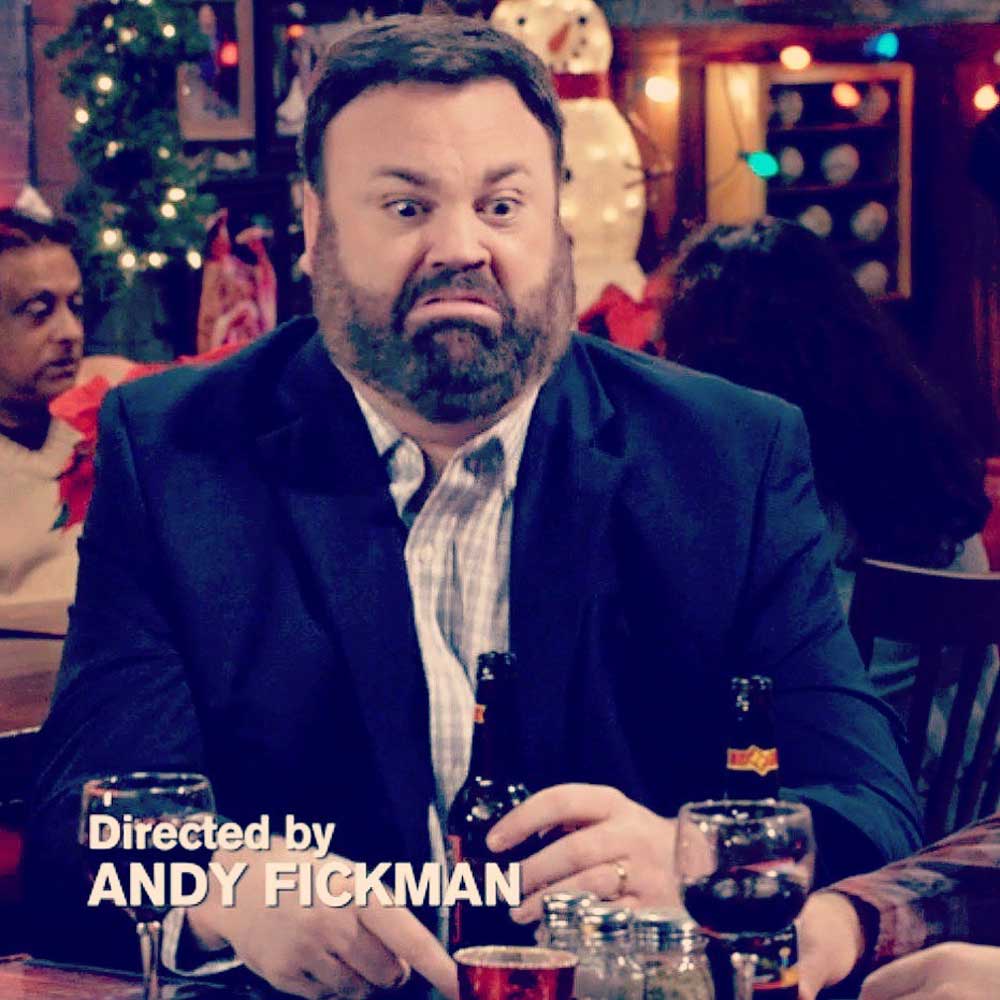 Chris Roach in Kevin Can Wait in a suit